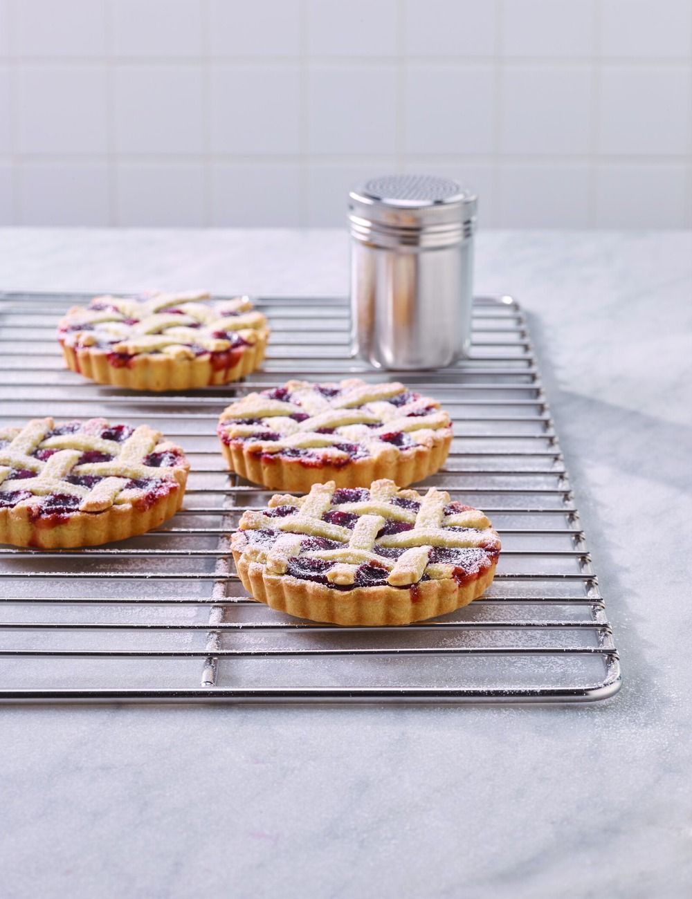 Tartelettes sur grille en fil inox GN 1/1 PADERNO - vue en perspective horizontale