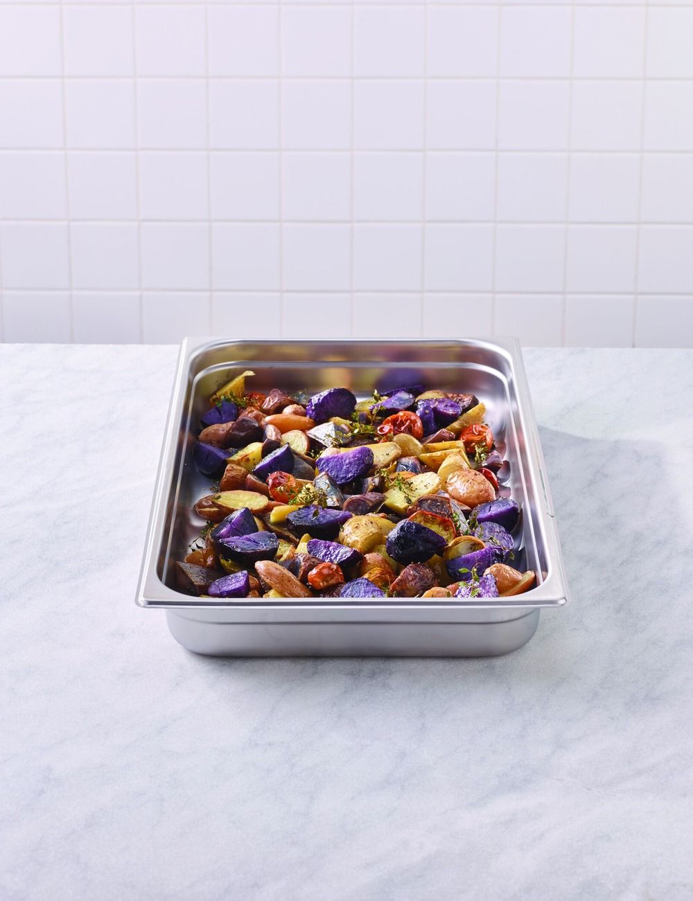 PADERNO stainless steel GN 1/1 container in use
