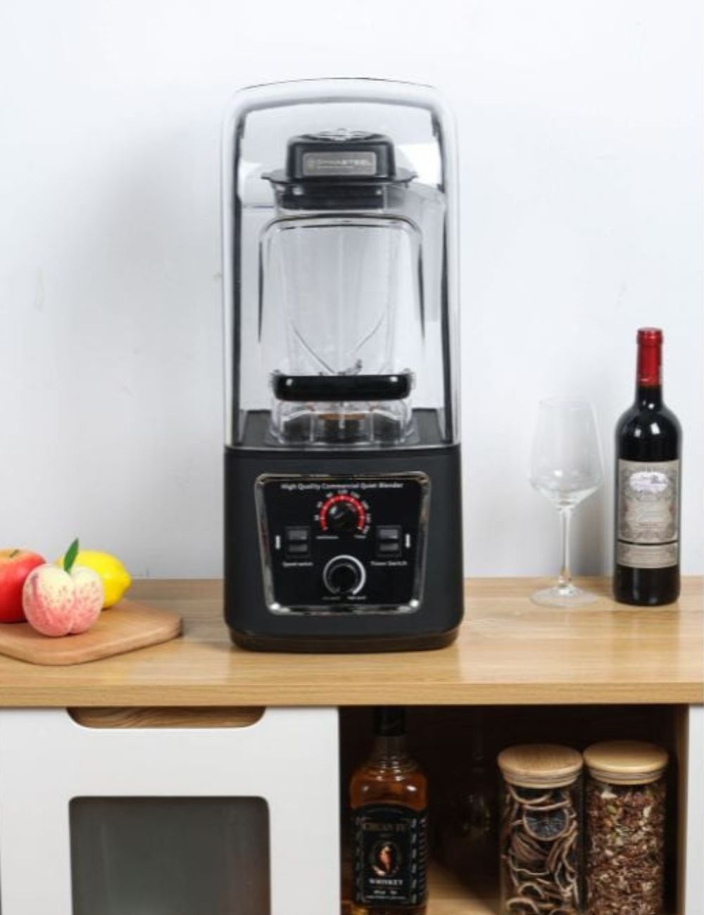 DYNASTEEL sound-insulated blender in use on a counter, enclosure closed