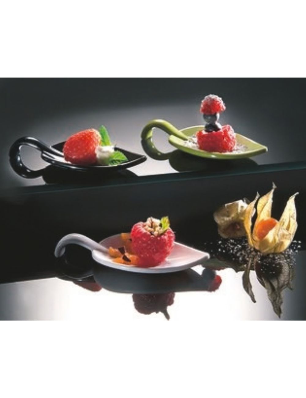 PADERNO leaf amuse-bouche spoons filled with red berries on a buffet display